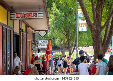 Athens, Georgia - June 22, 2019: A Crowd Scene On Washington Street Near The Main Stage During AthFest, A Three-day Music And Arts Festival.