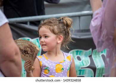 Athens, Georgia - June 22, 2019: A Young Girl Dances To Live Music In Front Of An Outdoor Stage During A Live Performance At The AthFest Music And Arts Festival.