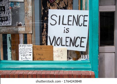 Athens, Georgia - June 25, 2020: Hand-drawn Anti-racist Signs On Display In The Front Window Of The World Famous, A Downtown Eatery And Music Venue.