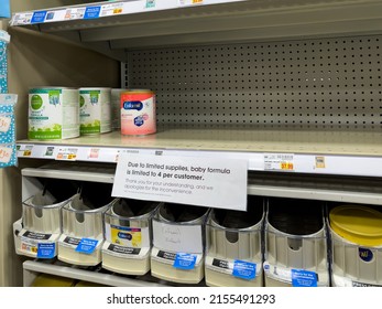 ATHENS, GEORGIA - May 12, 2022 : Infant baby formula product shortage. Empty Similac baby food shelves at an American grocery store supermarket.