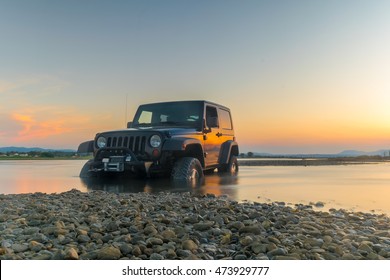 Athens, Greece 1 July 2016. Jeep 4x4 Against The Sunset. Jeep Got Stuck In The Mud.