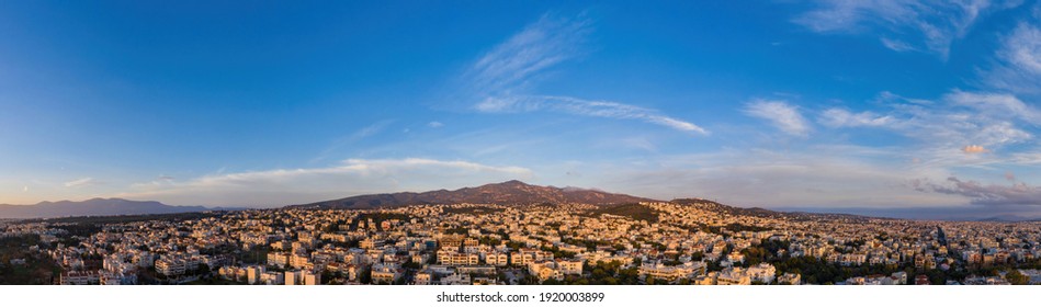 Athens, Greece Aerial Drone Panoramic View From Penteli Mount At Sunset. Sundown Over Greek Capital. 