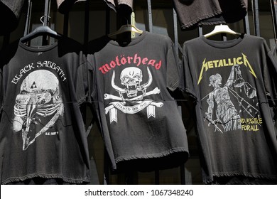 ATHENS, GREECE - APRIL 1, 2018: T-shirts for sale printed with heavy metal and hard rock music band logos.