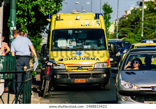 Athens Greece August 27,\
2019 View of a Greek ambulance parked in the streets of Athens in\
the morning