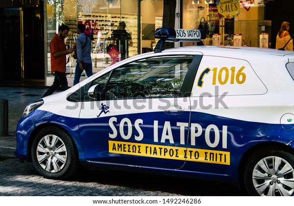 Athens Greece August 30,\
2019 View of a Greek paramedic car parked in the streets of Athens\
in the morning