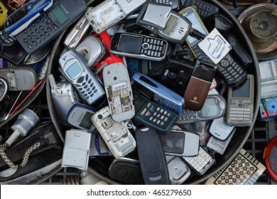 ATHENS, GREECE - AUGUST 4, 2016: Old Mobile Cell Phones. Pile Of Broken Handphones For Sale At Junk Shop.