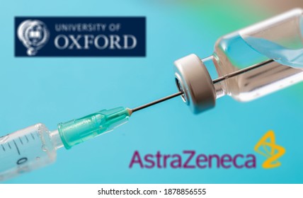 Athens, Greece. December 17, 2020. AstraZeneca Oxford vaccine logo on blue background. Covid19 vaccine vial and syringe, Coronavirus immunization concept