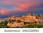 Athens, Greece: The Famous Acropolis of Athens with Parthenon Temple, Odeon of Herodes Atticus, Herodeion, at sunset. Europe travel destination