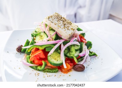 Athens, Greece. Greek Salad With Fresh Vegetables, Feta Cheese And Olives, Hellenic Traditional Cuisine.