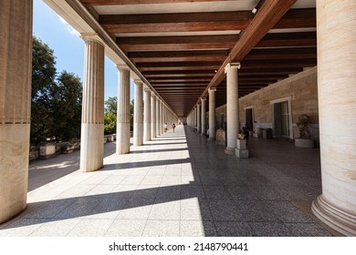 Athens, Greece - July 26, 2021: Stoa of Attalos, covered walkway or portico in the Agora of Athens. Typical for Hellenistic age, the stoa was more elaborate and larger than earlier building of ancient