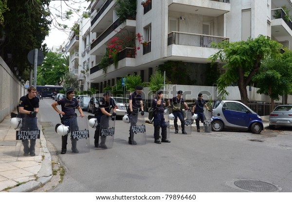 ATHENS, GREECE - JUNE 15: General strike\
against new $40.36 billion austerity program of tax hikes and\
sell-offs of state property on June 15, 2011 in Athens, Greece.\
Greek riot police block access to central\
square