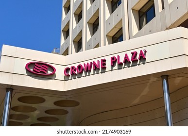 Athens, Greece - June 2022: Sign Above The Entrance To The Crowne Plaza Hotel In Athens City Centre