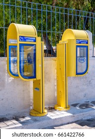 Athens, Greece. June 4, 2017. Yellow Public Pay Phone Booths Throughout Athens Accept Coins Or Pre Paid Cards.