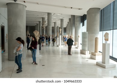 ATHENS, GREECE - MARCH 06, 2018: Visitors at the New Acropolis Museum in Athens. Designed by the Swiss-French Architect Bernard Tschumi.  - Shutterstock ID 1049663333