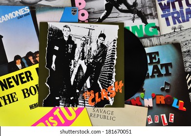 ATHENS, GREECE - MARCH 6, 2014: Vinyl records of punk rock bands and the debut album by The Clash released in 1977. Vintage LP album sleeves from the late 1970s and early 1980s.