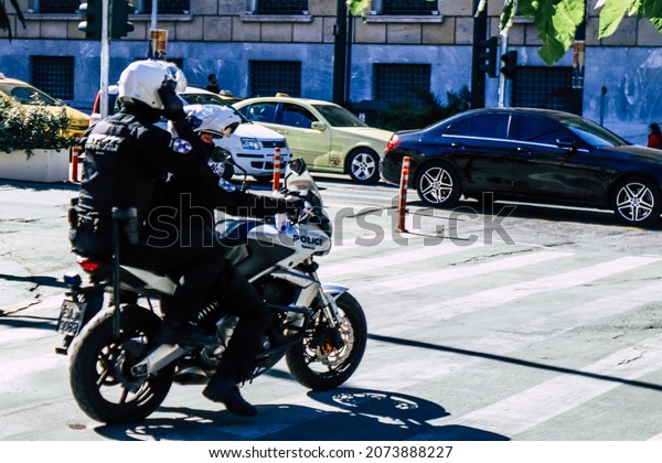 Athens, Greece - November 03, 2021 Greek police on\
patrol in the city center of Athens during the coronavirus epidemic\
hitting Greece