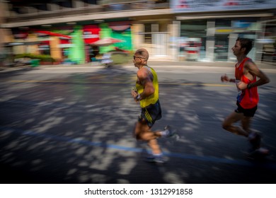 ATHENS, GREECE - NOVEMBER 10, 2013: 	 Athletes Running The Last Kilometers Of The 31st Athens Classic Marathon (The Authentic).