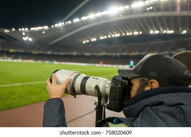 Athens, Greece - November 2, 2017: Photographer During The UEFA Europa League Game Between AEK FC Vs AC Milan At OAKA Spiros Louis Stadium