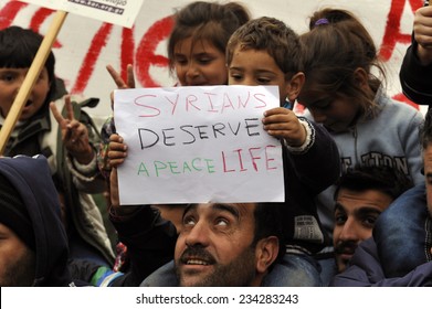 Athens Greece November 27 2014. Syrian war refugees sit in protest outside the Greek parliament 9 days, some of them on hunger strike, demanding asylum and a free passage to other countries in the E.U