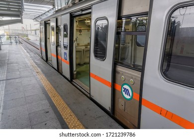 Athens, Greece - October 28 2017: empty metro train stopped at station. Coach without passengers with open doors on track at Eleftherios Venizelos International Airport Terminal.