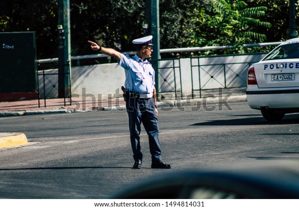 Athens Greece September 1, 2019 View of Greek
police officer standing front the tomb of the Unknown Soldier in
Athens in the morning