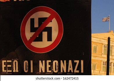 ATHENS, GREECE - SEPTEMBER 26. A banner in Greek reading, "out the new Nazi" in front of the Greek Parliament during a protest against far-right Golden Dawn party, in Athens, Sept. 25, 2013.