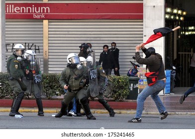 ATHENS, GREECE-March 11 Riot Police Under Attack From Rioter, During Demonstration, In Central Athens, March 11, 2010.