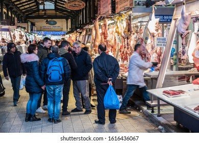 Athens Old Town, Attica - Greece - 12 28 2019 Greek People Buying Food For Christmas At The Butchers Houses At The Central Municipal Market