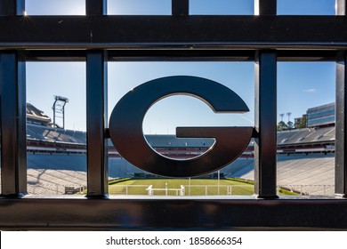 Athens, United States: April 11, 2020: Georgia Logo On Sanford Stadium Fence With Empty Stadium Seats