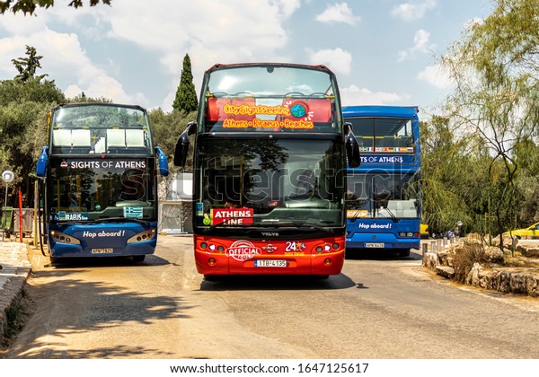 Athens/Greece/July 18 2018: Sight Seeing Buses\
Parked at\
Acropolis