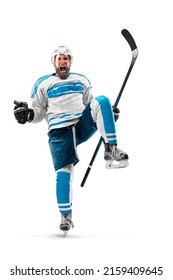 Athlete In Action. Very Emotional Hockey Player With Stick And Puck In His Hands. Sports Emotions. Hockey Athlete With Desire To Win And Be Champion