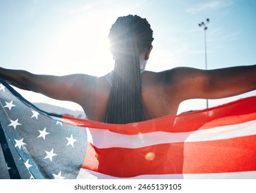 Athlete, American flag and sports with a woman outdoor at a stadium to celebrate country, pride and win. Back of a person for sport event , fitness and exercise achievement at competition in USA - Powered by Shutterstock