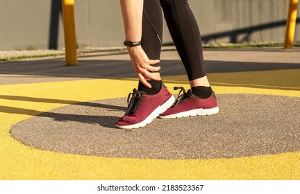 Athlete Ankle Pain, Sports Injury. Woman Holding Painful Foot. Sprains, Strains, Fracture, Tendonitis. Health Problems Concept. High Quality Photo