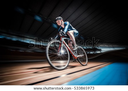 Similar – Man on bicycle preparing for triathlon race