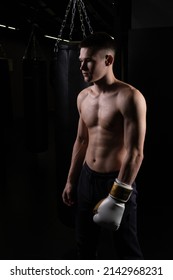 Athlete The Blows Boxer The Bag Practices Glove Black Young Male Competition, In The Afternoon Muscular Fighter In Power For Fit Competitive, Training Sweat. Backlit Active Box, Fitness