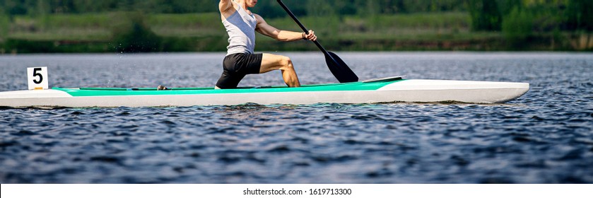 Athlete Canoeist Rowing In Canoe, Competition Race