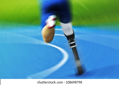 athlete with carbon prosthesis  on race track - Powered by Shutterstock