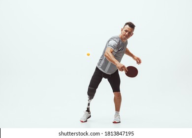 Athlete With Disabilities Or Amputee Isolated On White Studio Background. Disabled Sport And Healthy Lifestyle Concept.