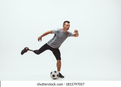 Athlete with disabilities or amputee on studio background. Football player - Powered by Shutterstock