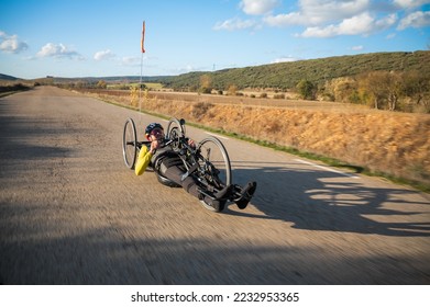 Athlete with disability training with His Handbike on a Track. High quality photography. - Powered by Shutterstock