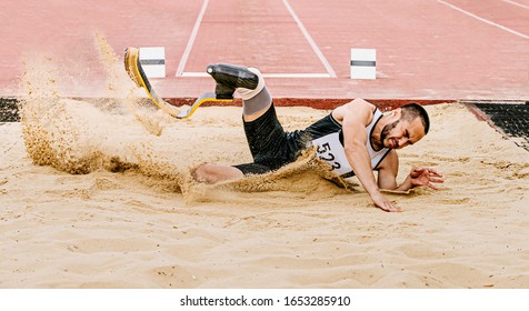 Athlete Disabled Amputee On Prosthetic Long Jump In Para Athletics