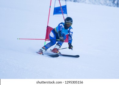 Athlete engaged in the race of super g , giant slalom downhill alpine ski racer professional