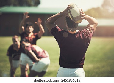 Athlete, game and rugby ball on field for training, workout and exercise in summer for fitness. Sports, team and wellness for challenge, collaboration and compete for professional college player. - Powered by Shutterstock