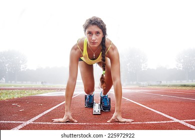 athlete on the starting blocks - Shutterstock ID 225972922