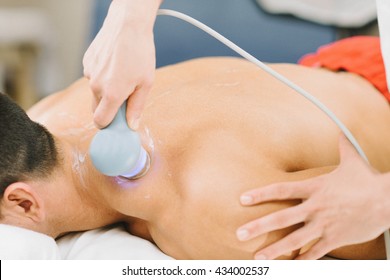 Athlete Receiving Ultrasound Physical Therapy Treatment