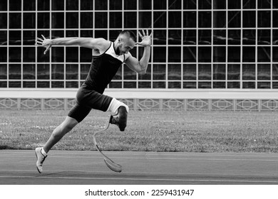 athlete runner disabled run on track black and white photo - Powered by Shutterstock