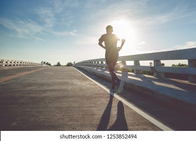 Athlete Runner Feet Running On Road