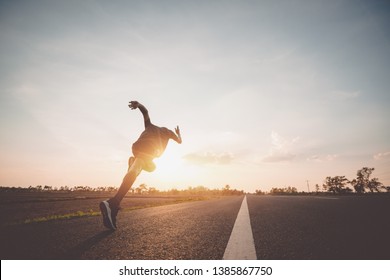 Athlete runner feet running on road, Jogging concept at outdoors. Man running for exercise. - Shutterstock ID 1385867750