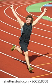 Athlete Running Victory Lap Celebrates.