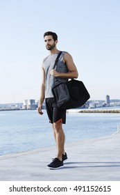 Athlete With Sports Bag Walking